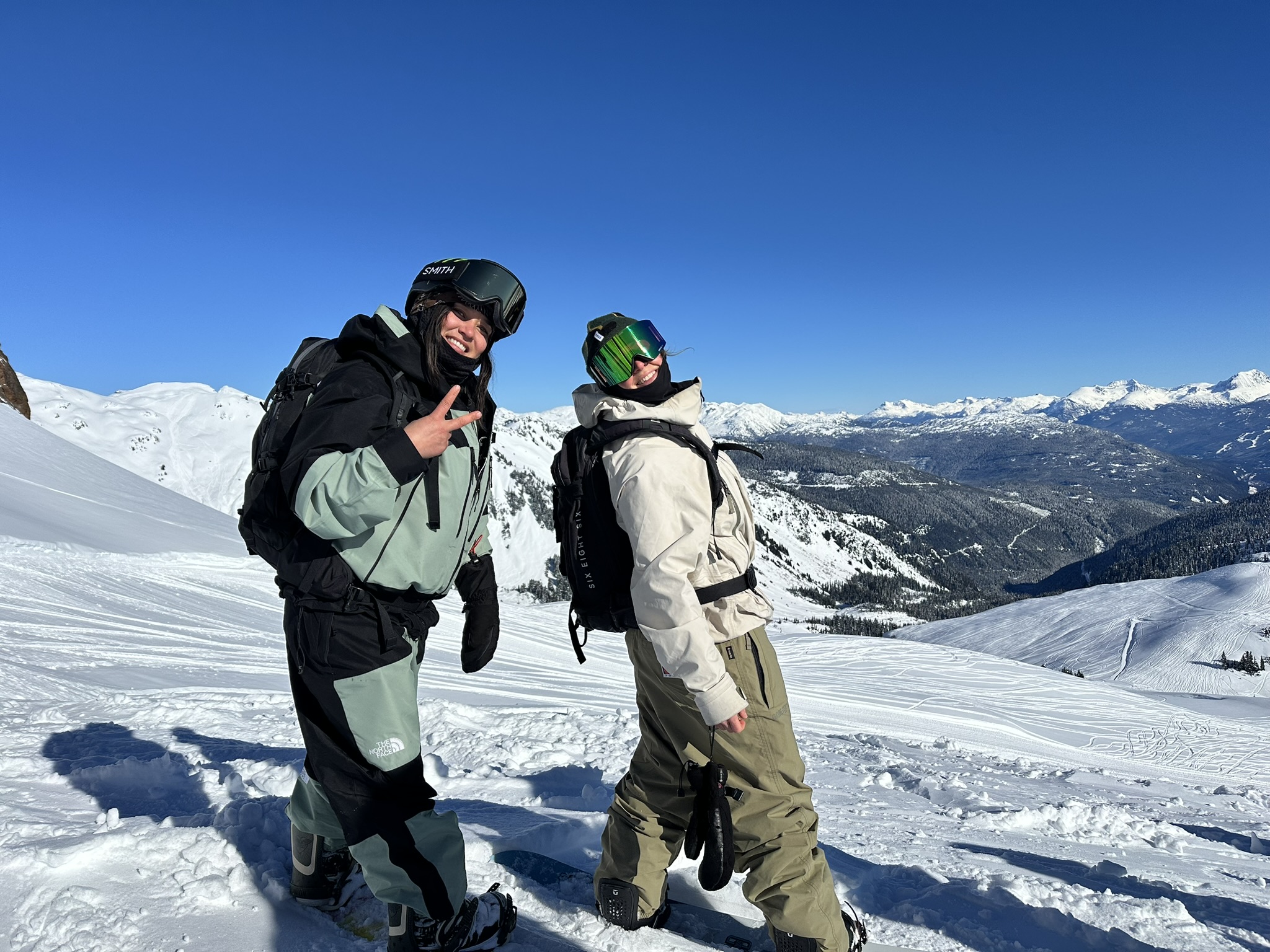 Darrah Reid and Jess Kimura on a snowy mountain